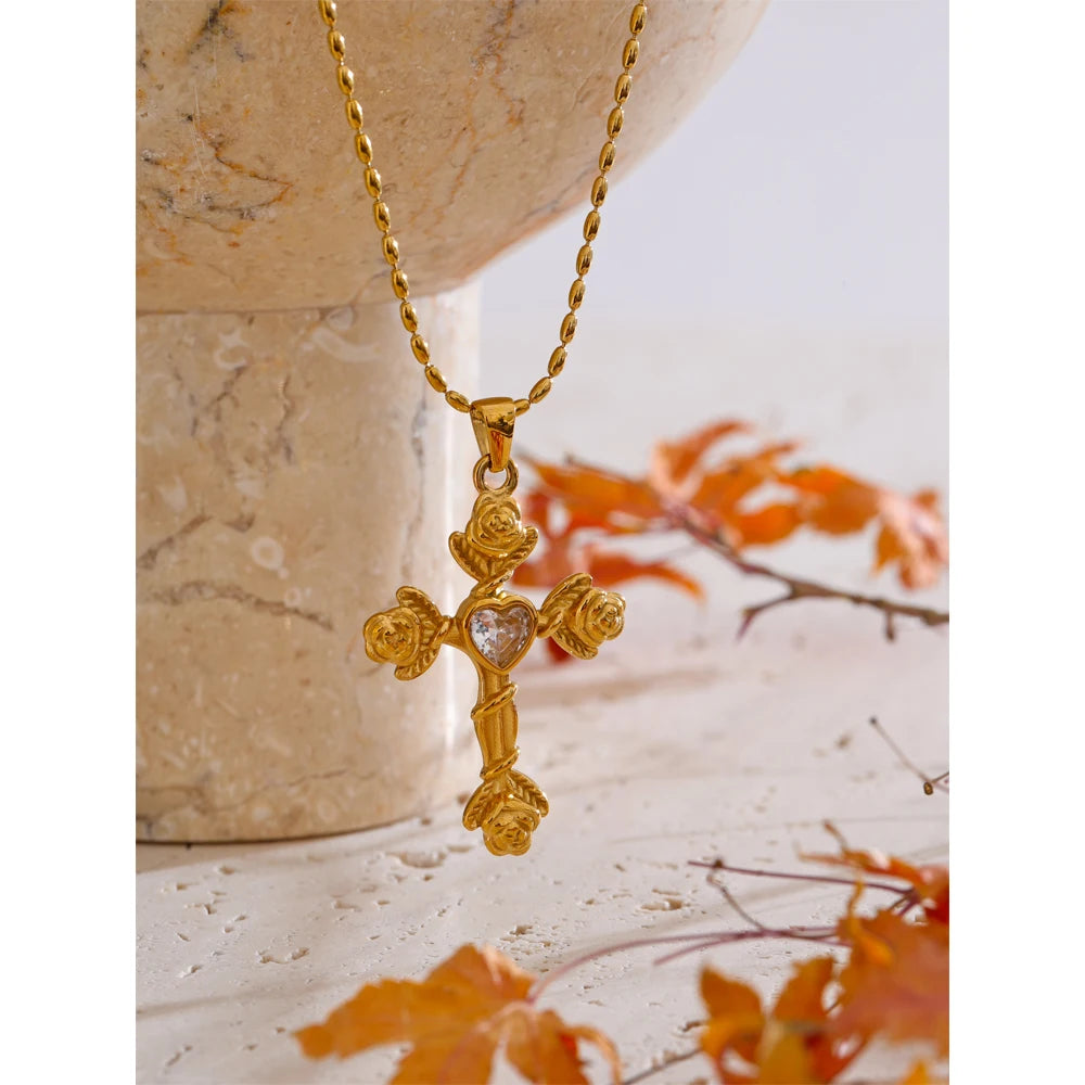 AMI CROSS NECKLACE